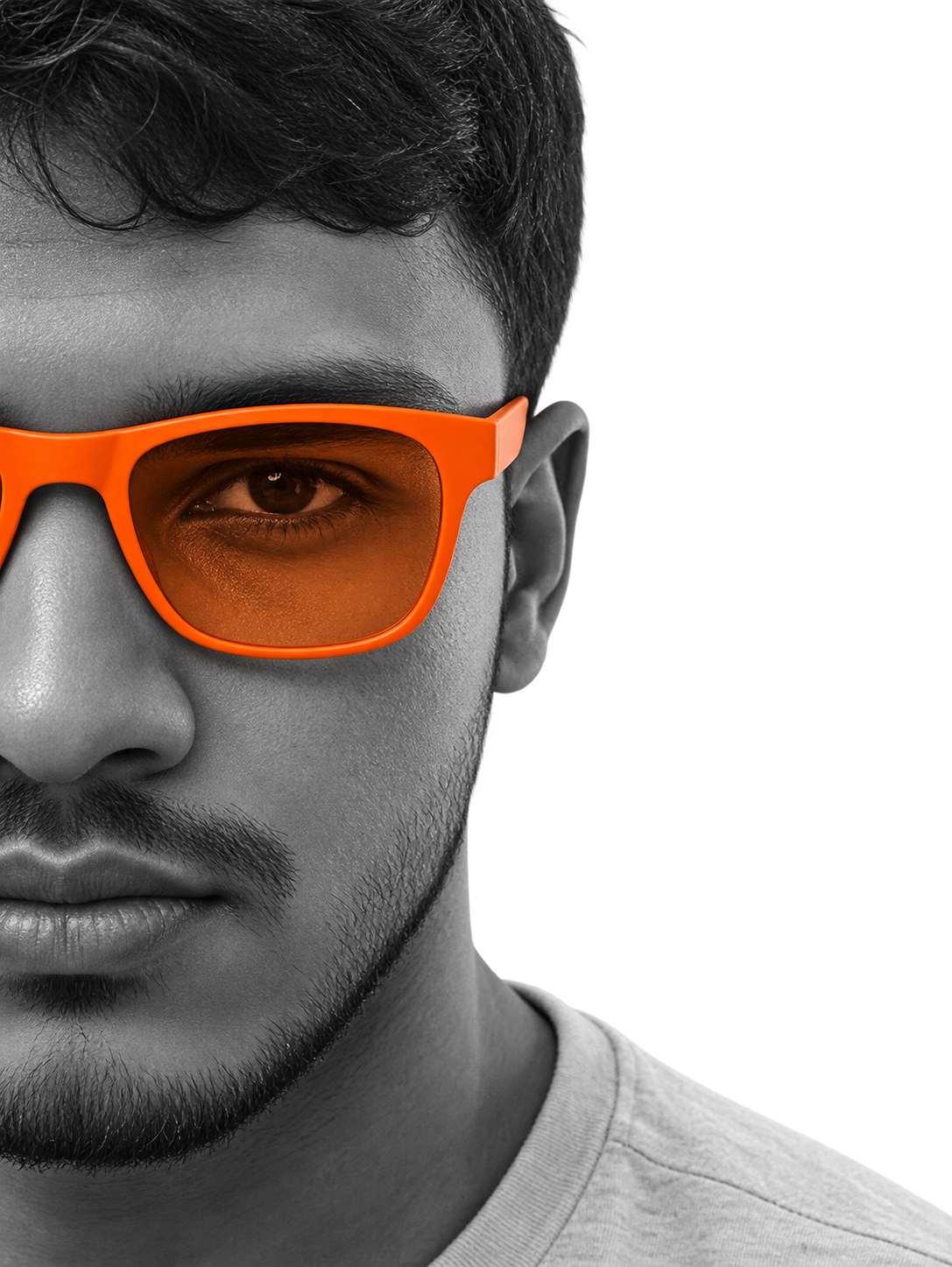 Haris wearing orange glasses